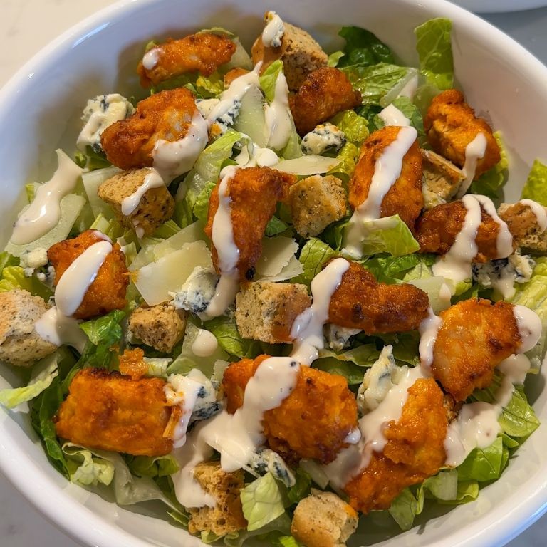 Buffalo Chicken Caesar Salad with Blue Cheese Crumbles