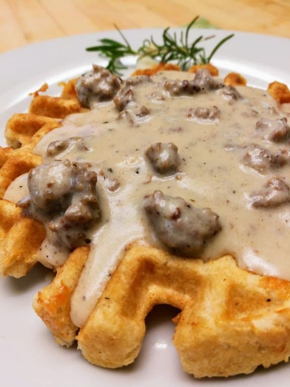 Cheesy Sausage Gravy Over Waffles