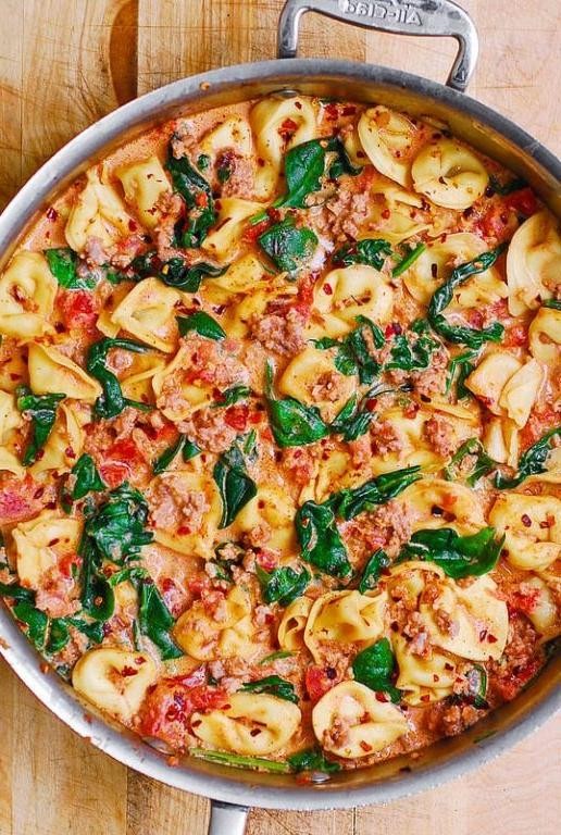 Creamy Sun-Dried Tomato Tortellini with Spicy Sausage
