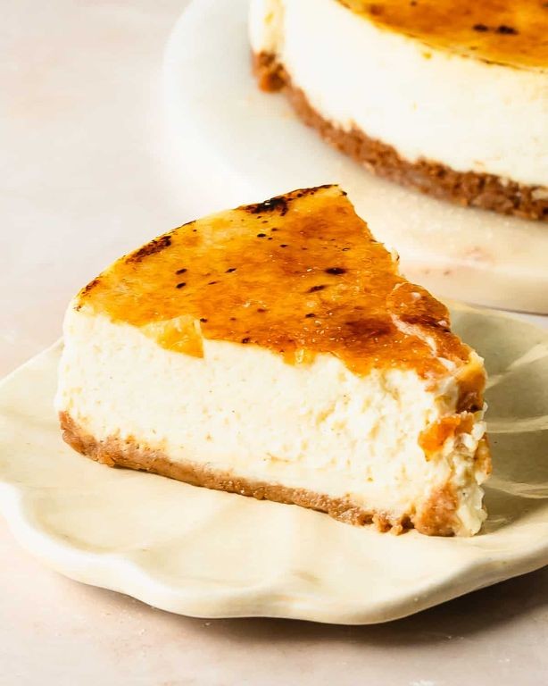 Crème de violette cheesecake with graham cracker crust