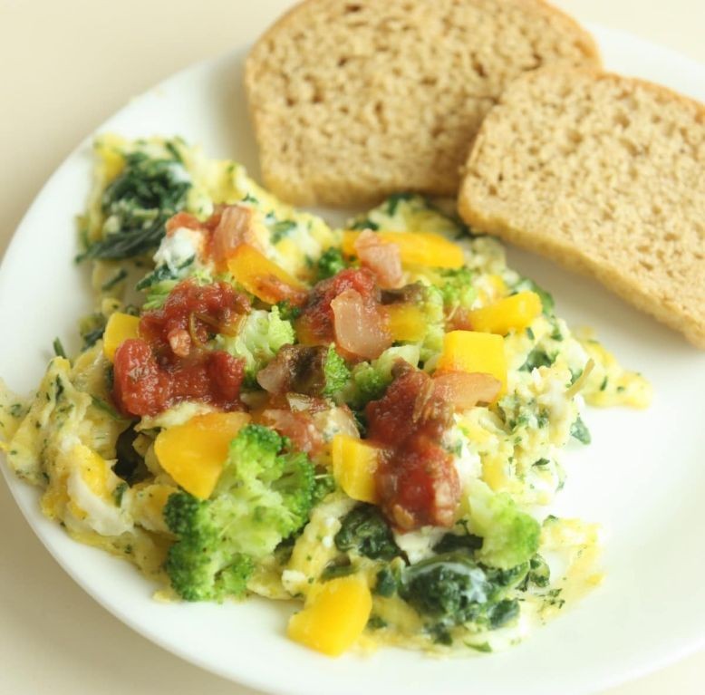 Egg and vegetable scramble with whole wheat toast