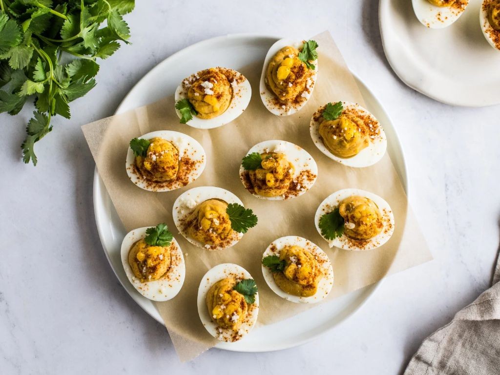 Elote Deviled Eggs with Paprika and Cotija