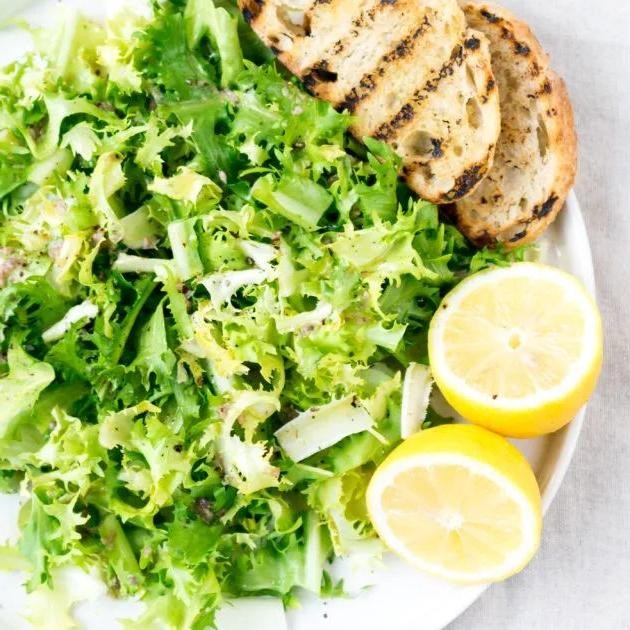 Frisee with Roasted Garlic and Anchovy Dressing