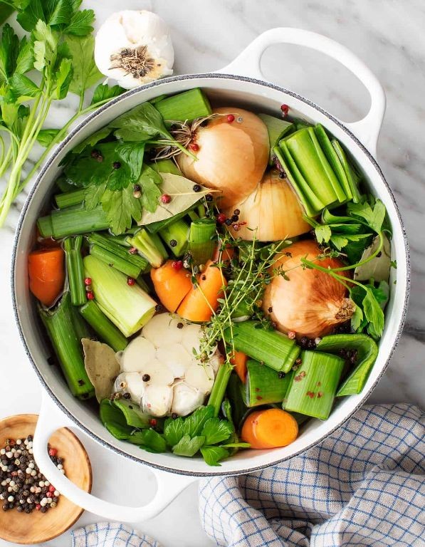 Homemade vegetable broth with seasonal veggies