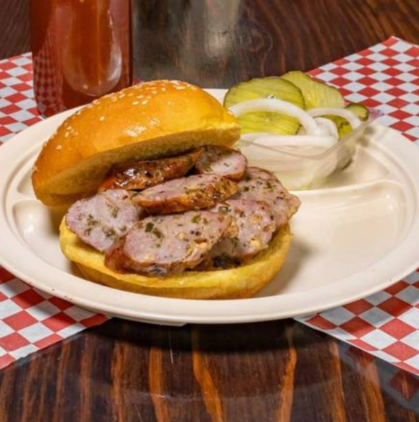 Jalapeño Cheddar Sausage Sandwich with Pickled Red Onions