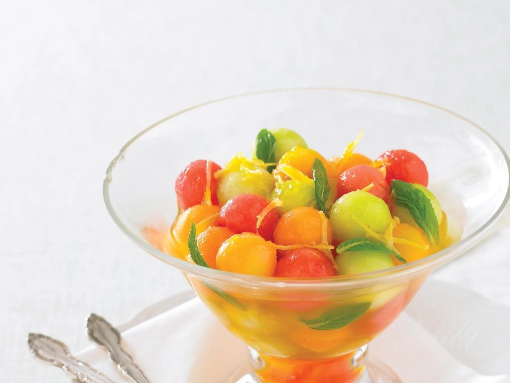 Melon balls in ginger syrup