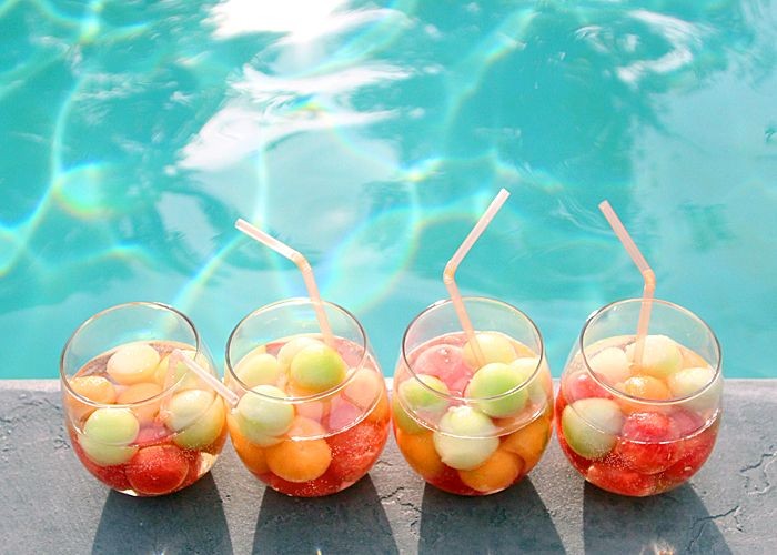 Melon balls in sparkling wine