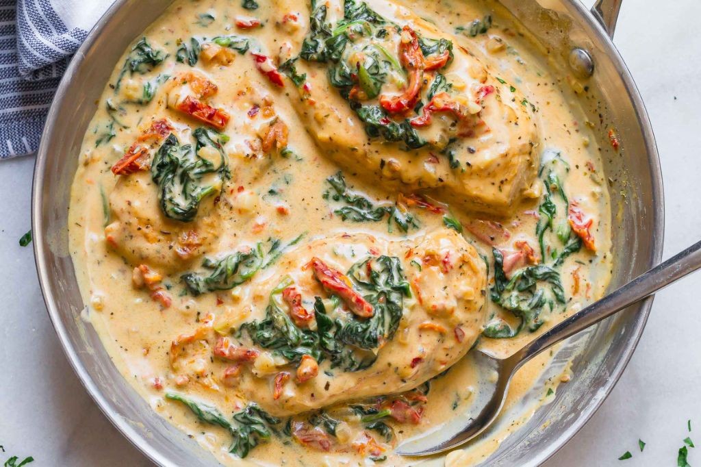 Parmesan Chicken Breast with Spinach Cream Sauce