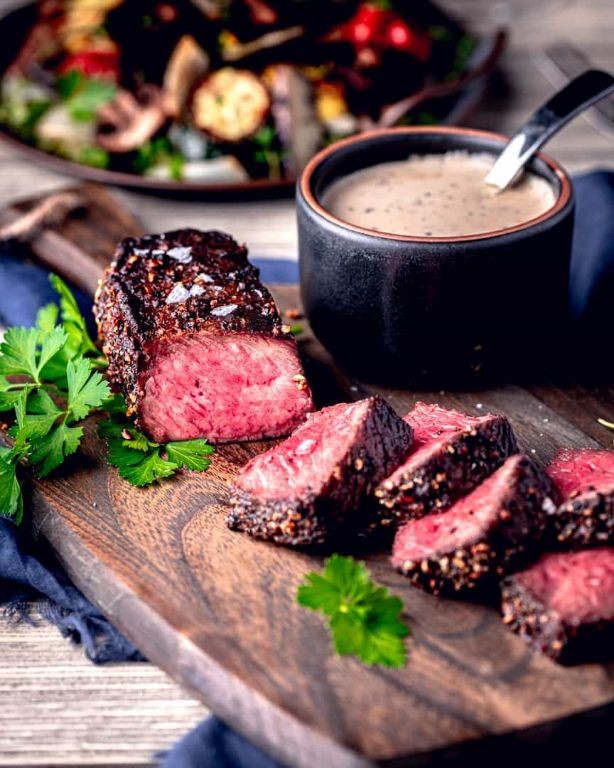 Peppercorn-Crusted Venison Steak with Brandy Cream