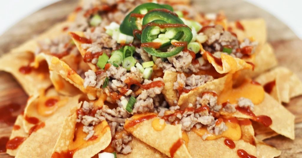Pork Belly Nachos with Sriracha Cream
