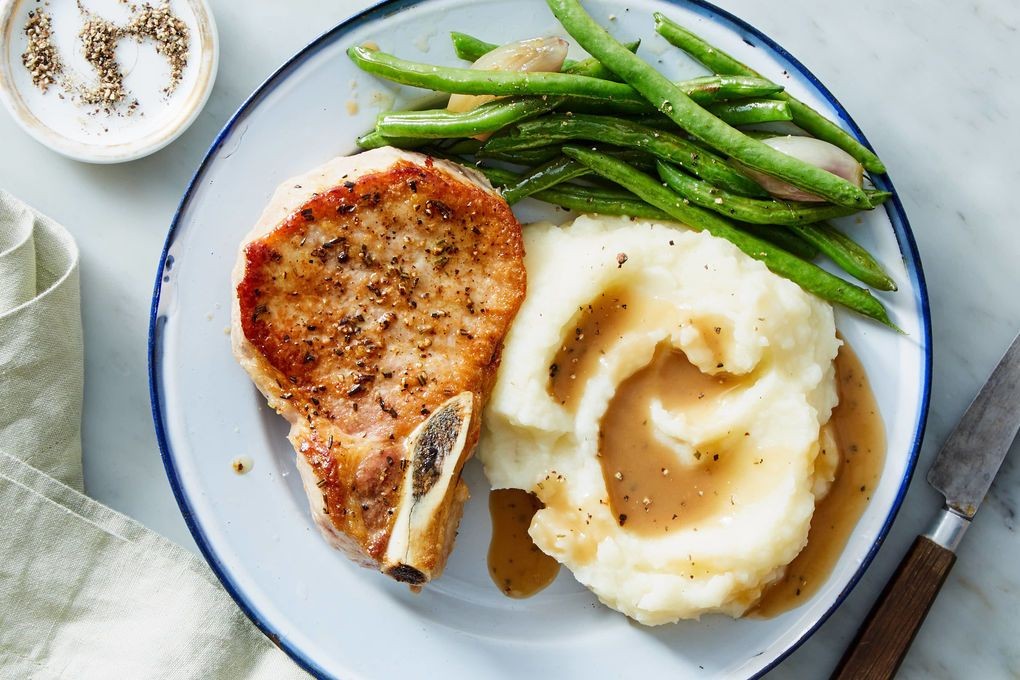 Skillet Pork Chops with Roasted Garlic Mash