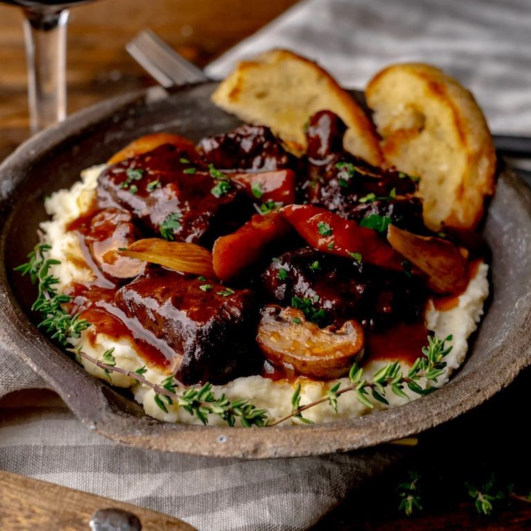 Slow-Cooked Elk Roast with Red Wine Reduction