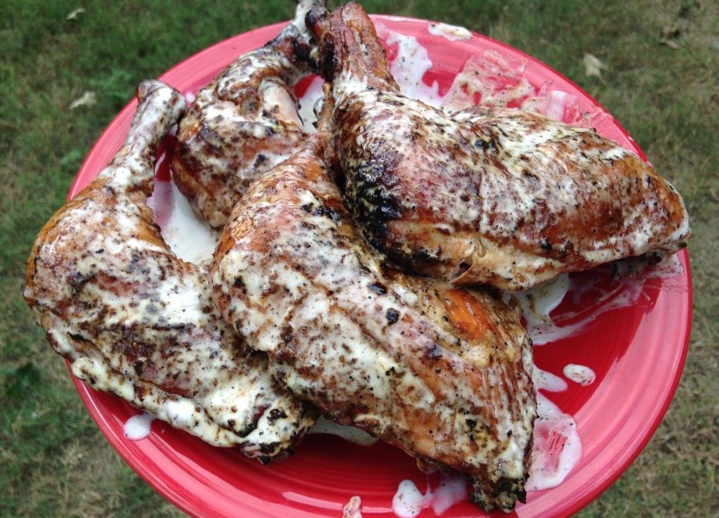 Smoked Traeger Chicken Quarters with Alabama White Sauce