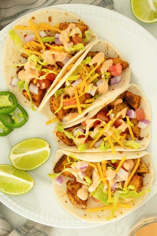 Spicy Chicken Breast Tacos with Potatoes and Onions