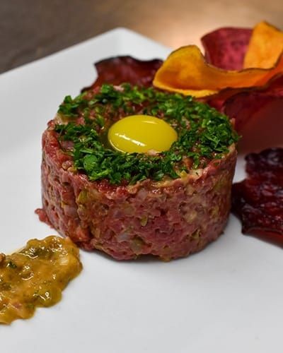 Steak Tartare with Quail Egg and Truffle Oil