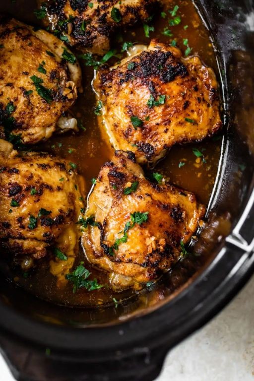 Tender Crock Pot Chicken Thighs with Garlic and Herbs
