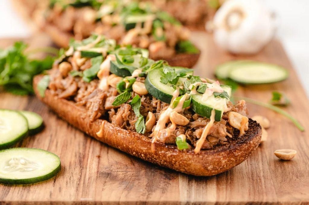 Thai Peanut Rotisserie Chicken Sandwich with Cucumber Slaw