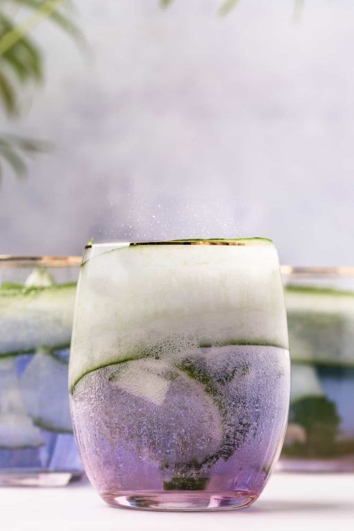Violet-infused gin and tonic with cucumber