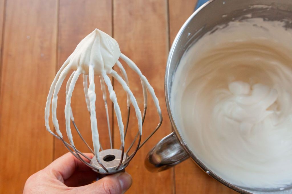 Whipped Cream Frosting with Hand-Whisked Peaks