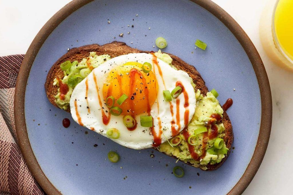 Avocado and Egg Toast on Whole Grain Bread