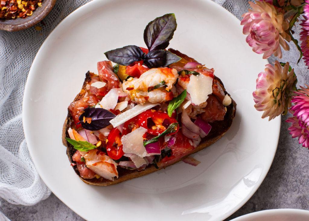 Deviled shrimp bruschetta with chili flakes