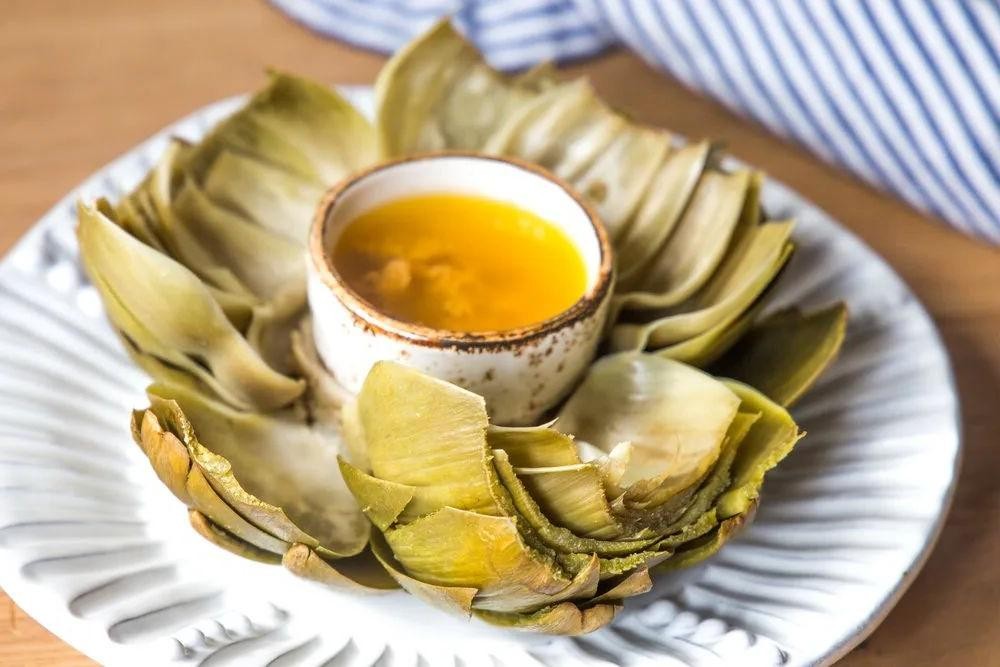 Garlic Butter Steamed Whole Artichokes