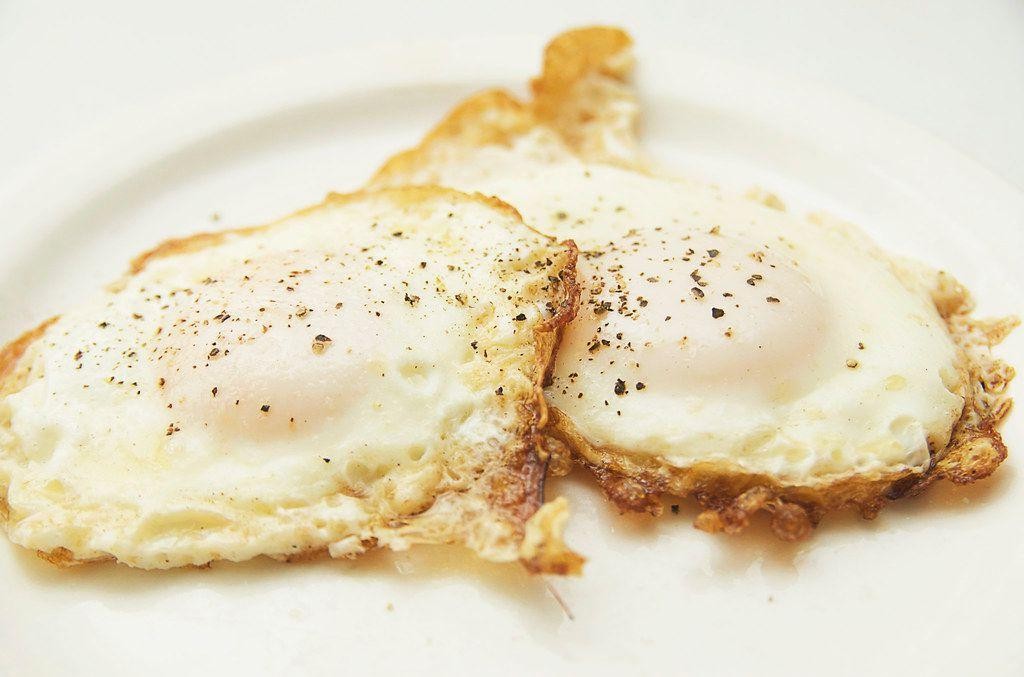 Ghee-fried eggs with crispy edges