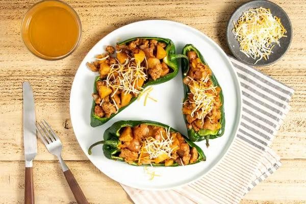 Pork Picadillo Stuffed Peppers
