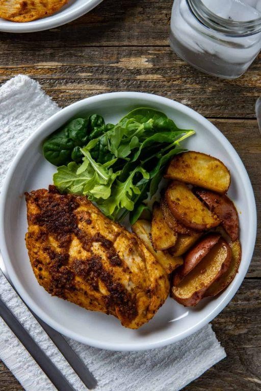 Spicy Cajun Baked Chicken and Potato Wedges